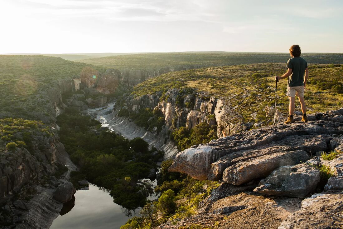 A hiker above a canyon in the Texas Panhandle
