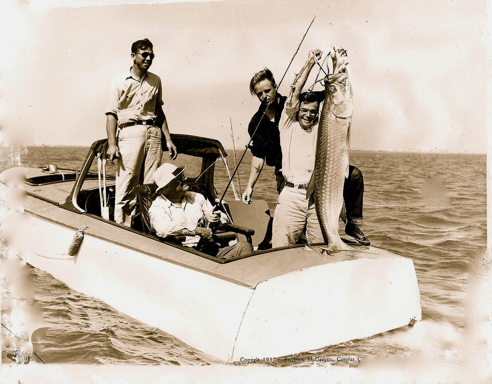 A 1937 photograph of a giant tarpon catch on the Texas coast